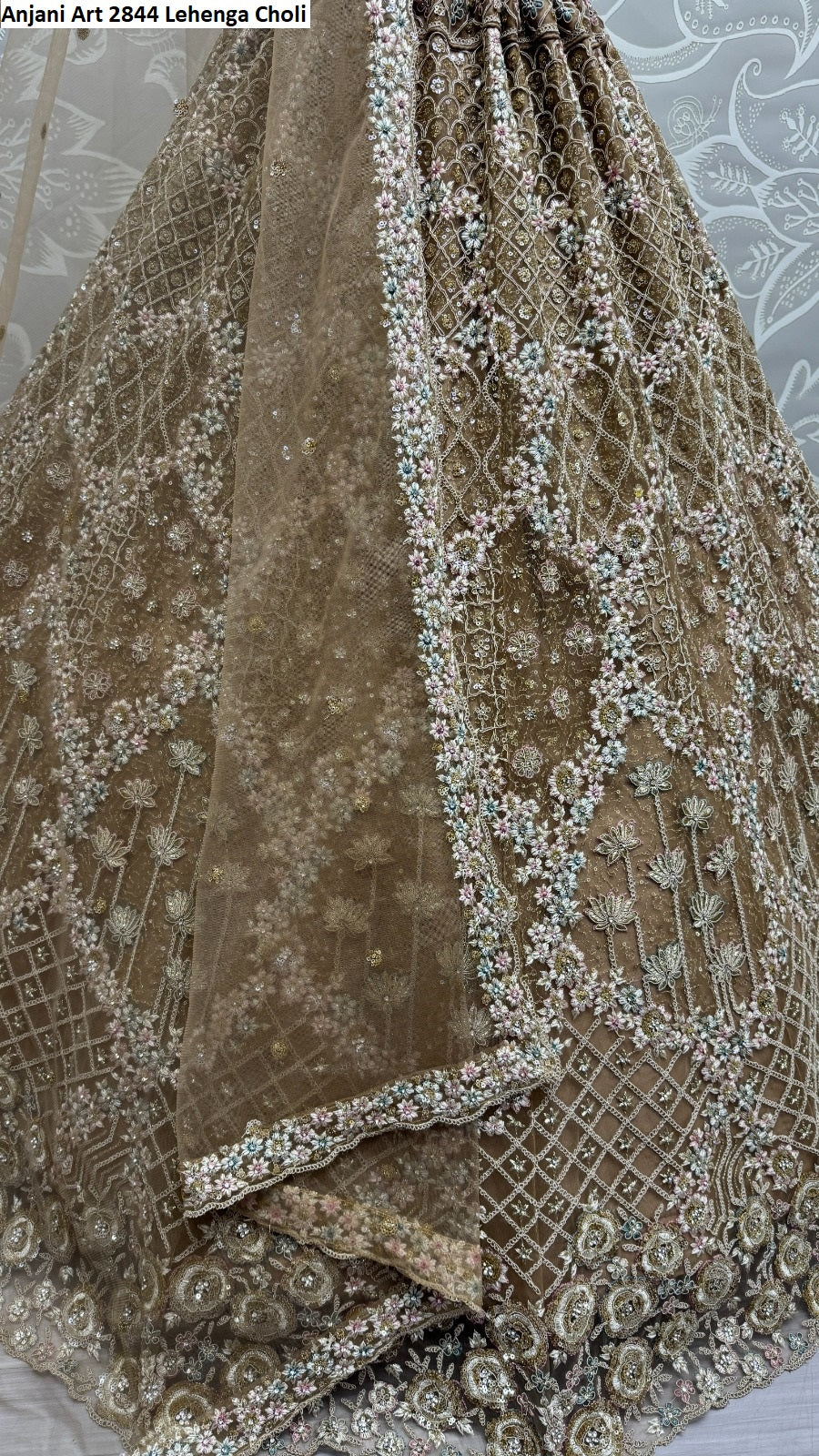 2844B Anjani Art Heavy Net Lehenga Choli