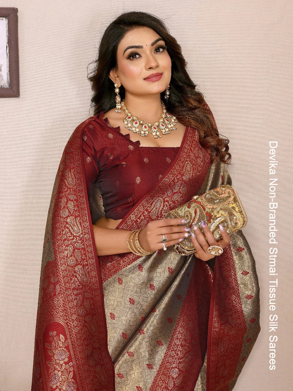 Devika Non-Branded Stmai Tissue Silk Sarees