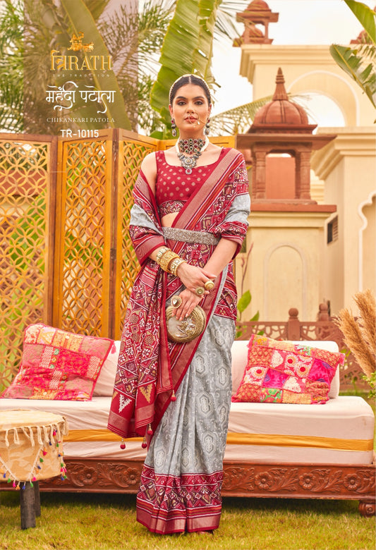 10115 Mehendi Patola Trirath Sarees