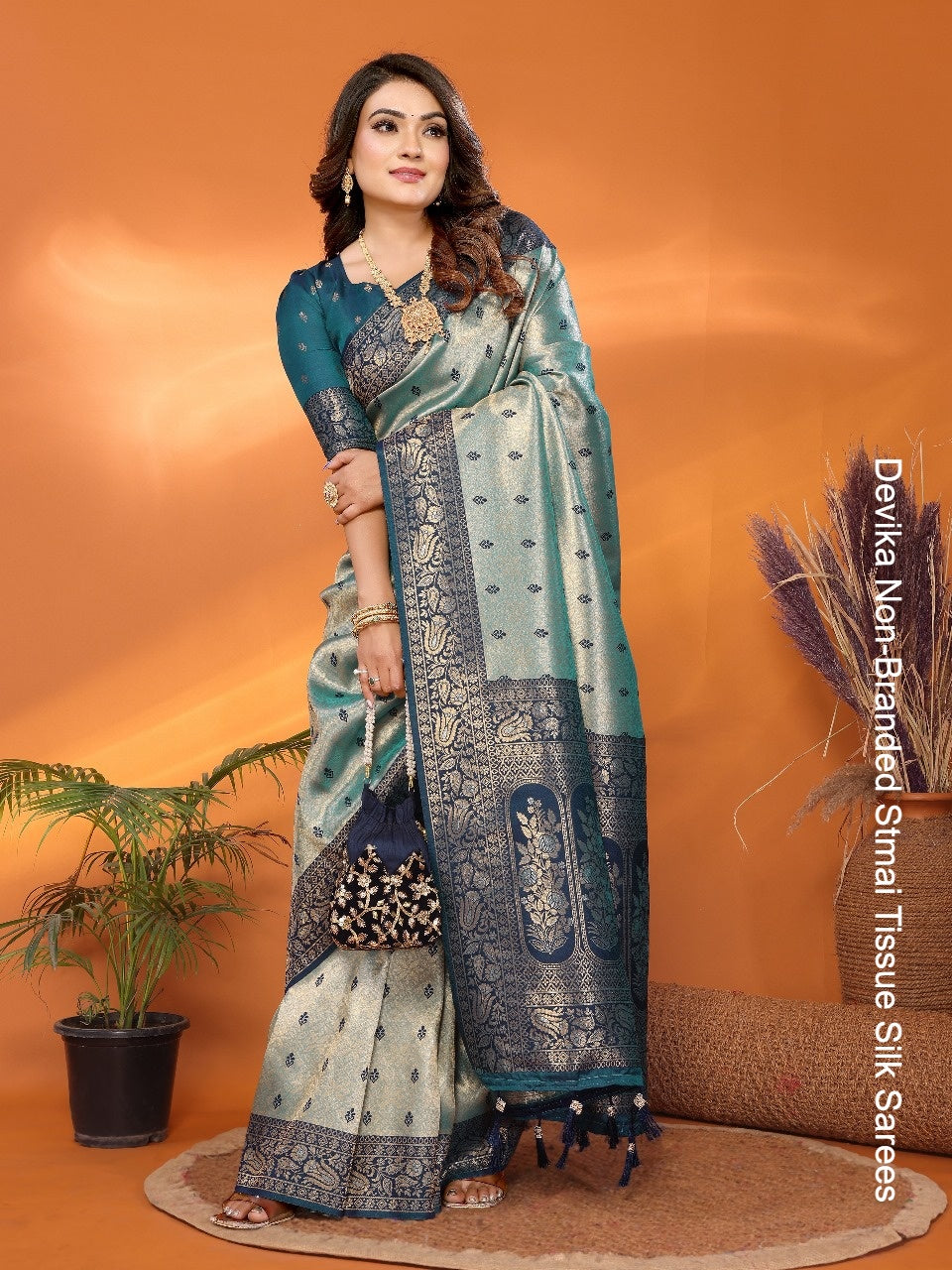 Devika Non-Branded Stmai Tissue Silk Sarees
