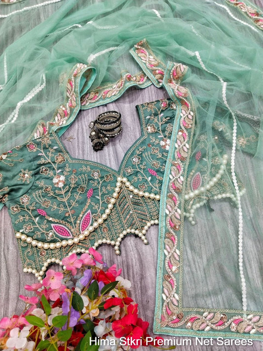 Hima Stkri Premium Net Sarees