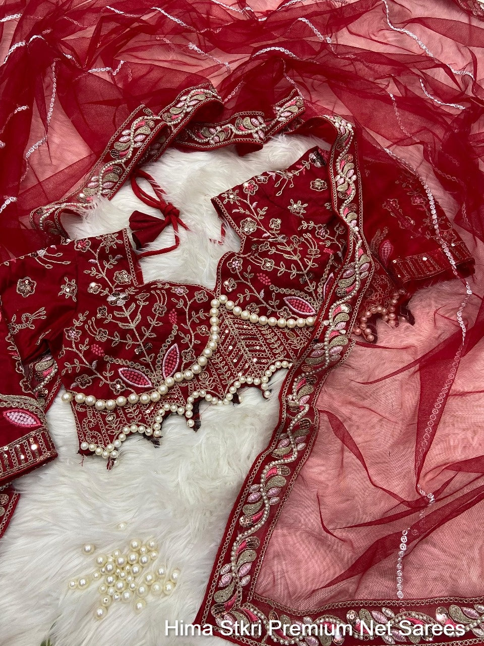 Hima Stkri Premium Net Sarees