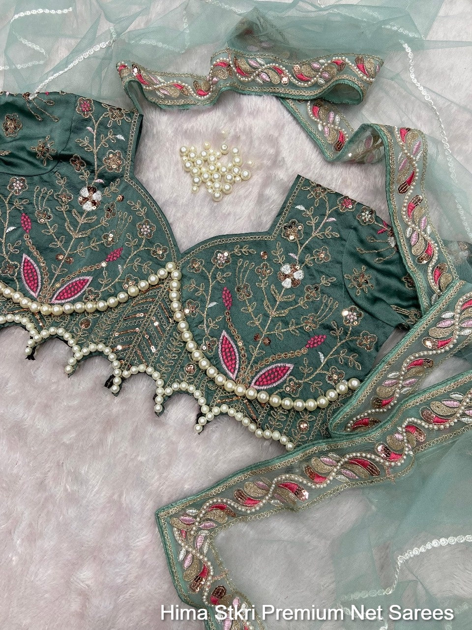 Hima Stkri Premium Net Sarees