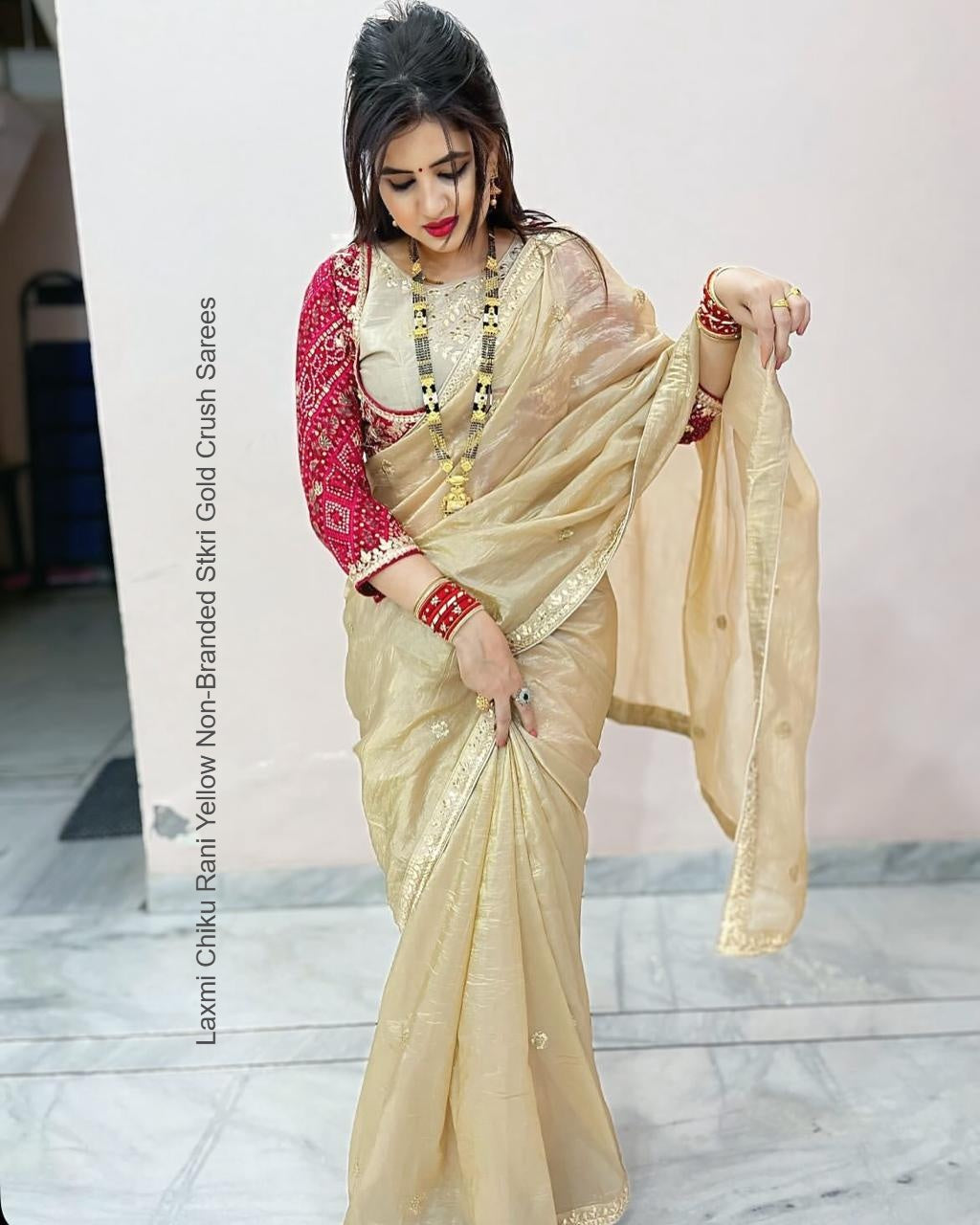 Laxmi Chiku Rani Yellow Non-Branded Stkri Gold Crush Sarees