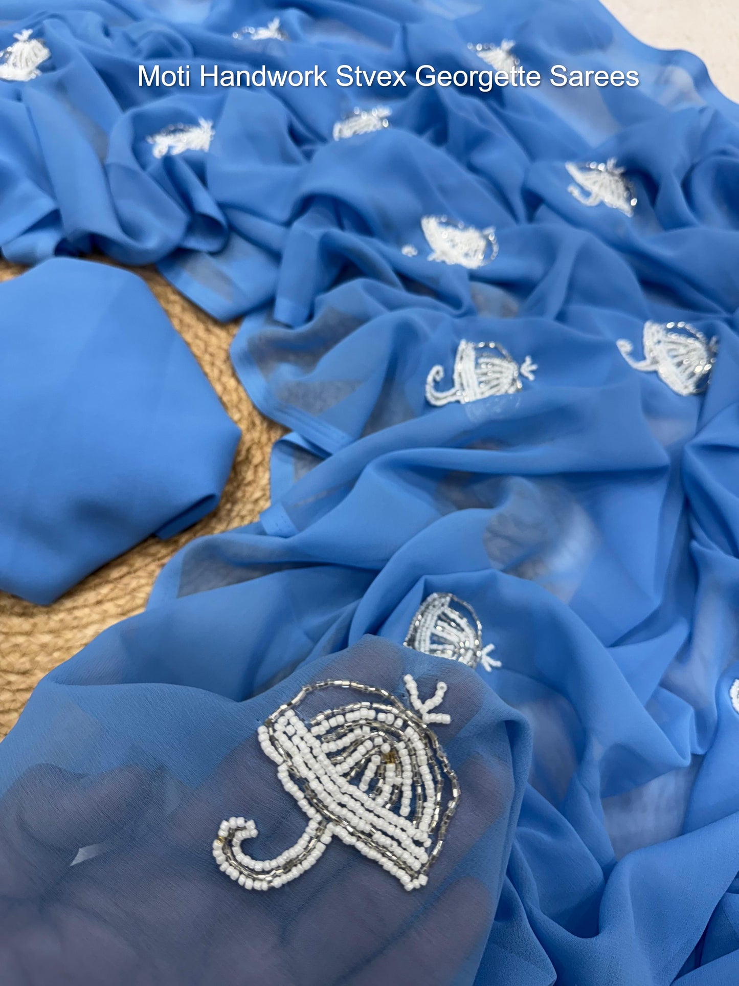 Moti Handwork Stvex Georgette Sarees